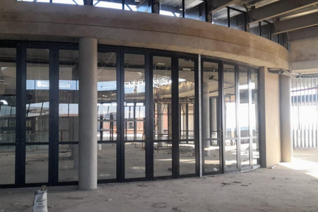 Early construction commerical retail shopfront entrance aluminium