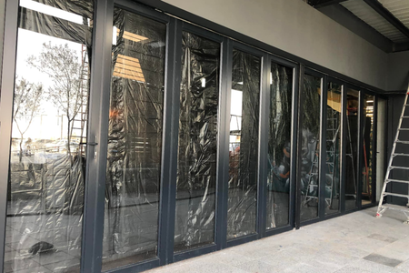 Long aluminium entrance and glass door