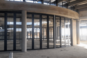 Early stage commercial retail shopfront construction with aluminium entrance by 3MC Services KZN