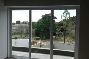 Residential aluminium doors under construction by 3MC Services Durban
