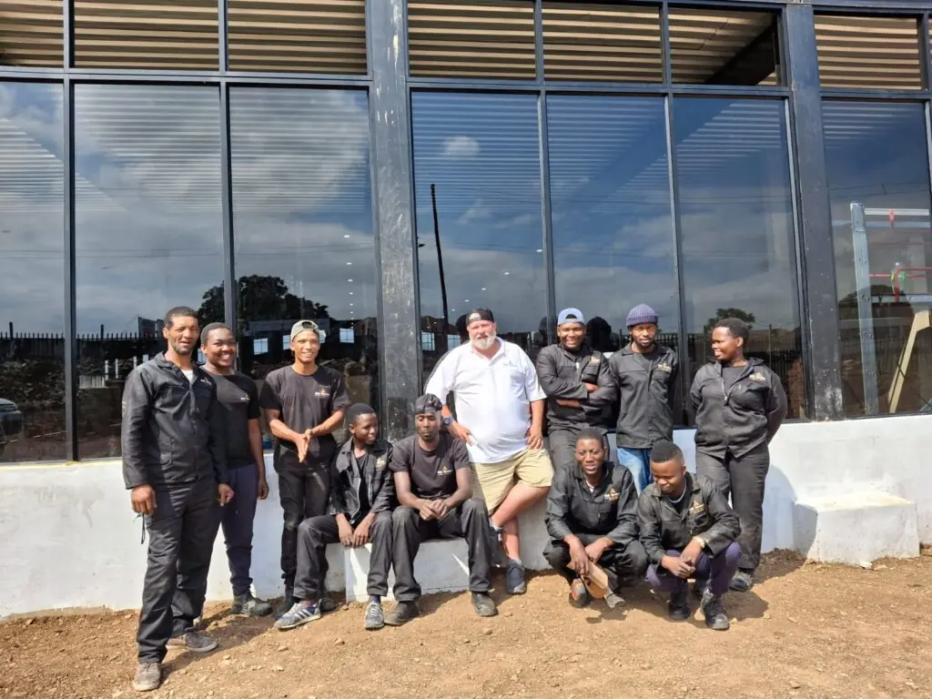 3MC Services installation team at completed aluminium glass curtain wall project, Durban KZN