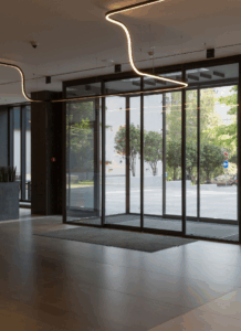 Glass entrance installation for commercial building by 3MC Services KZN