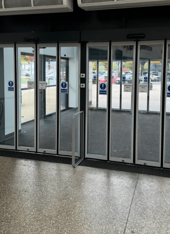 Large automatic folding door installation for commercial space by 3MC Services Durban